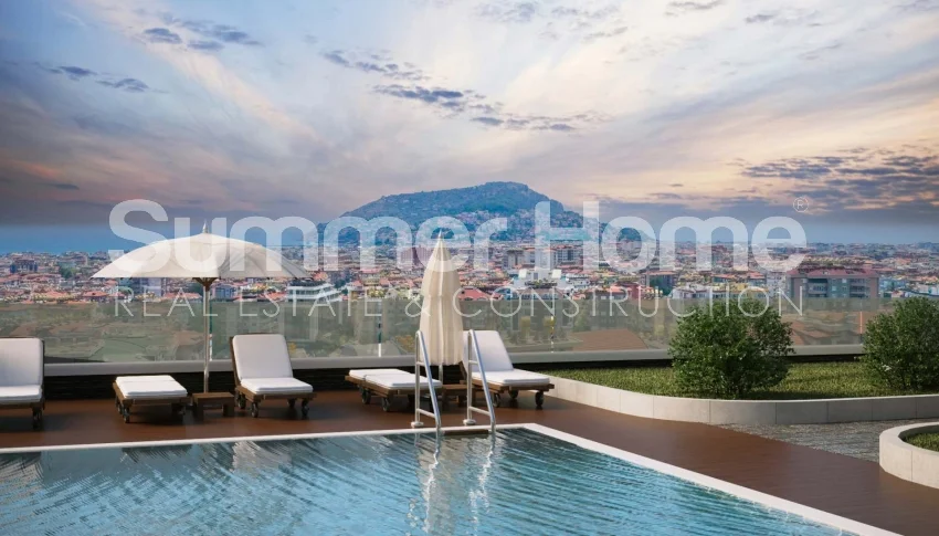 Ultra-luxe duplex-appartementen met vier slaapkamers. zwembad en tuinen. Panoramisch uitzicht over Alanya